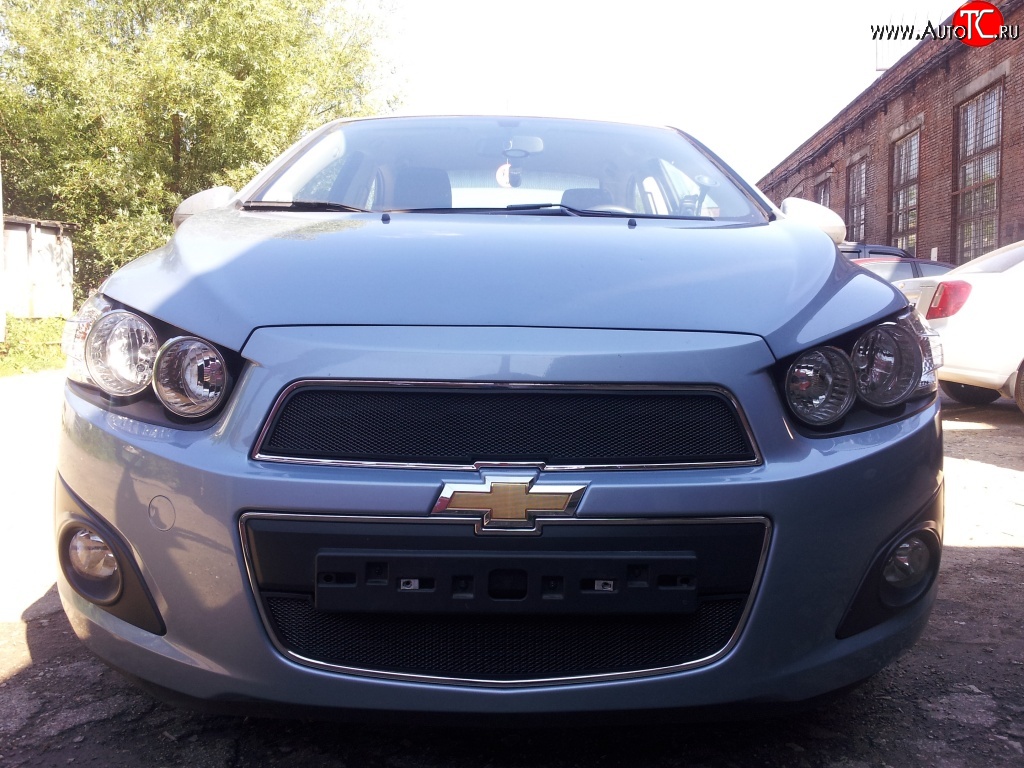 1 469 р. Нижняя сетка на бампер Russtal (черная) Chevrolet Aveo T300 седан (2011-2015)  с доставкой в г. Королёв