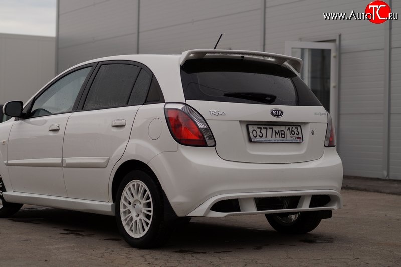 5 899 р. Накладка заднего бампера Vita Dm  KIA Rio ( 2 JB,  4 FB) (2005-2024) дорестайлинг, хэтчбэк 5 дв., рестайлинг, хэтчбэк 5 дв., рестайлинг седан (Неокрашенная)  с доставкой в г. Королёв