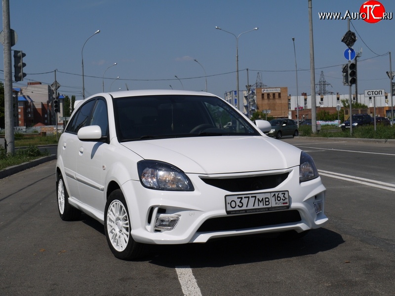 10 999 р. Передний бампер Vita Dm  KIA Rio ( 2 JB,  4 FB) (2005-2024) дорестайлинг седан, дорестайлинг, хэтчбэк 5 дв., рестайлинг, хэтчбэк 5 дв., рестайлинг седан (Без сетки, Неокрашенный)  с доставкой в г. Королёв