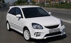 10 999 р. Передний бампер Vita Dm  KIA Rio ( 2 JB,  4 FB) (2005-2024) дорестайлинг седан, дорестайлинг, хэтчбэк 5 дв., рестайлинг, хэтчбэк 5 дв., рестайлинг седан (Без сетки, Неокрашенный)  с доставкой в г. Королёв. Увеличить фотографию 5