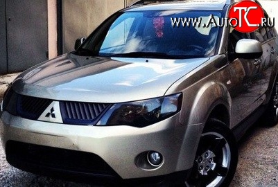 1 529 р. Темная защита передних фар SIM Mitsubishi Outlander XL (CW)  дорестайлинг (2005-2009)  с доставкой в г. Королёв